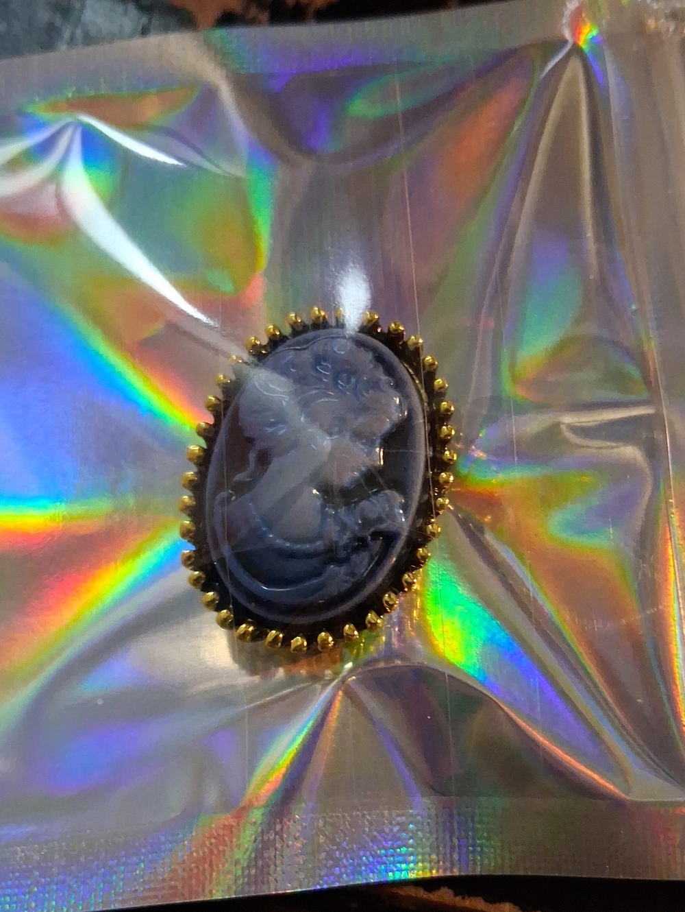 Victorian-Style Black Cameo Brooch with Gold Trim